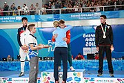 Deutsch: Fechten bei den Olympischen Jugend-Sommerspielen 2018: Tag 1, 7. Oktober 2018, Jungen, Säbel, Siegerehrung - Gold: Krisztián Rabb (HUN), Silber: Hyun Jun (KOR), Bronze: Mazen Elaraby (EGY); Medaillen überreicht durch IOC-Mitglied Britta Heidemann, Maskottchen überreicht durch FIE-Generalsekretär Emmanuel Katsiadakis English: Fencing at the 2018 Summer Youth Olympics at 7 October 2018 – Boys' sabre Medal ceremony – Gold: Krisztián Rabb (HUN), Silver: Hyun Jun (KOR), Bronze: Mazen Elaraby (EGY); Medal presenter: IOC member Britta Heidemann, Mascot presenter: FIE Secretary General Emmanuel Katsiadakis