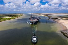 Kitty Hawk being towed in the Brownsville Ship Channel on 31 May 2022. Final Voyage of the Kitty Hawk-04.jpg