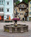 * Nomination Fountain the Saint Antony church in Urtijëi, South Tyrol. --Moroder 08:54, 15 July 2019 (UTC) * Promotion  Support Good quality. --Manfred Kuzel 09:10, 15 July 2019 (UTC)