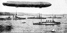 A German dirigible hovering over a British fleet. Germandirigible-overbritishfleet1914.jpg