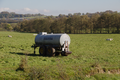 English: Water trailer with integrated trough in pasture near Lanzenhain, Herbstein, Hesse, Germany Deutsch: Weidetränkewagen nahe Lanzenhain, Herbstein, Hessen