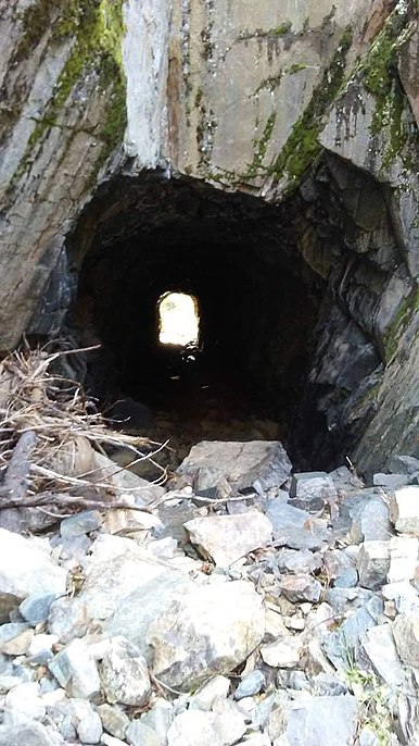 This was a hole in the mountain in La Porte, California. It was used to divert the water in Slate Creek.