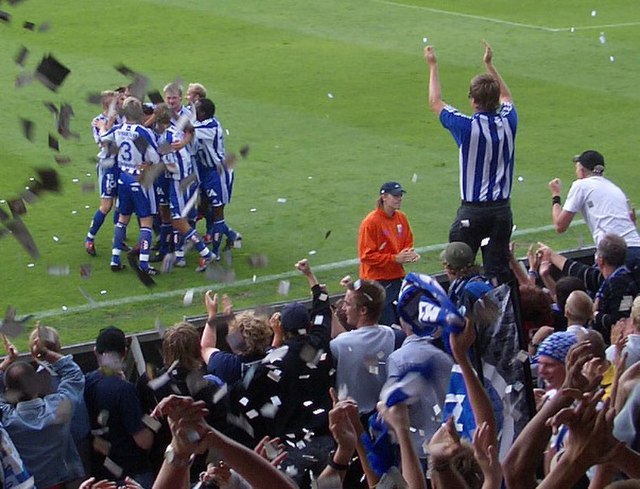 IFK Göteborg and their fans celebrate a goal against Örebro SK in 2004.
