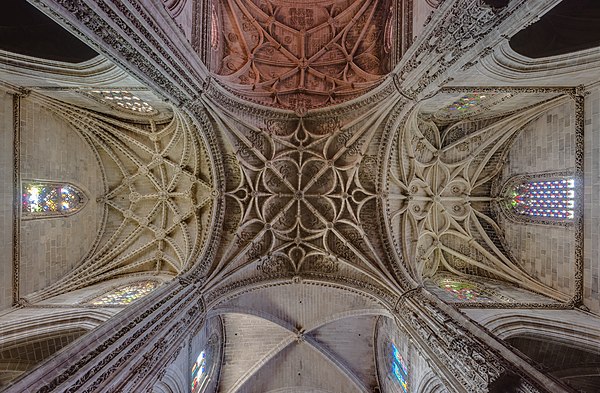 [[Commons:Featured pictures/<add the category here>]] * Info Crossing of the Church of San Miguel, Jerez de la Frontera, Spain. The church is composed of 3 naves, where the central nave is higher than the lateral ones, with pillars decorated with gothic motifs and very diverse baldachins. The construction of the church began in 1484 due to a visit of the Catholic Monarchs to Jerez de la Frontera, but it took several centuries to complete, resulting in a harmonious mixture of elements from the late Gothic, Renaissance and Baroque.