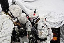 8th Alpini Regiment mortar team Italian Army - 8th Alpini Regiment soldiers align a 120mm mortar during exercise Abbey Road 2019.jpg