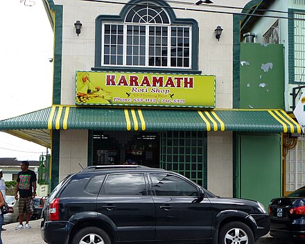 Karamath Roti Shop a.k.a. D' Humming Bird Roti Shop at Coffee Street in San Fernando, Trinidad and Tobago where the roti wrap was invented