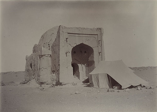 Image from Aurel Stein's visit. A tomb (possibly a mosque) at the southeast corner, viewed from the east.