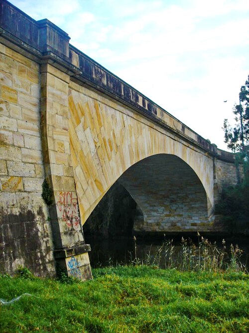 The creek flowing under the Lansdowne Bridge, Lansdowne.