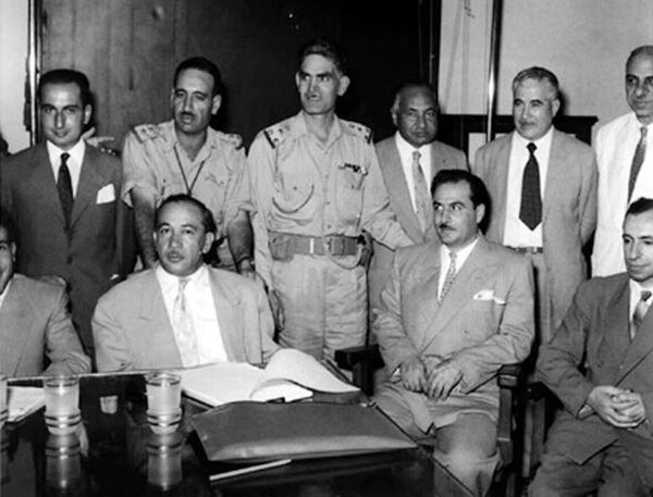 Leaders of the 14 July 1958 revolution in Iraq, including Khaled al-Naqshabendi (front row, left), Abd as-Salam Arif (back row, second from left), Abd