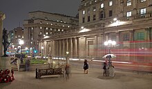 The Bank of England acts as the UK's central bank, influencing interest rates paid by private banks, to achieve targets in inflation, growth and employment. London MMB >>2C0 Royal Exchange.jpg