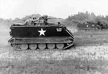 The M113 is the most widely used military example of the controlled differential system. M113-fort-meade-1965.jpg