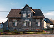 Deutsch: Verschiefertes Fachwerkhaus in der Bahnhofstraße 6 in Höhn, Westerwald English: Timber framed house in the Bahnhofstraße 6 in Höhn, Westerwald