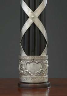 Base of the Mace, bearing the manufacturer's name and year of production Mace of the U.S. House of Representatives (base).png