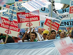 Image 48Union members march in Argentina on Human Rights Day in December 2005.  The signs read "Worker rights are human rights..