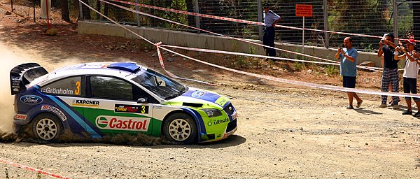 Grönholm driving a Ford Focus RS WRC 06 at the 2006 Cyprus Rally.