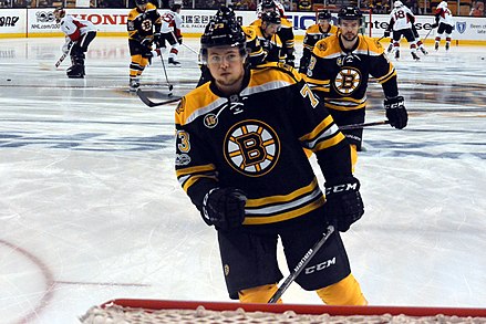 Charlie McAvoy and other players warming up prior to a game in the 2017 Stanley Cup playoffs. The Bruins qualified for the Stanley Cup playoffs for the first time since 2014.