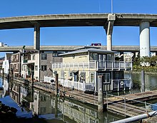 Houseboats on Mission Creek  with Interstate 280 freeway ramps above