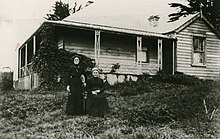 Scottish immigrant Elizabeth Wilson (right) and her daughter outside Betsland, an early farm house in the Hillcrest area (circa 1880s) Mrs Wilson and daughter in the garden of their home Betsland (1880s).jpg