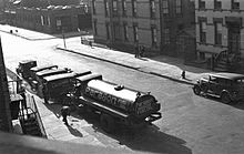 A Paragon Oil truck servicing a Brooklyn apartment building in the 1930s. Paragon Fuel Oil.jpg