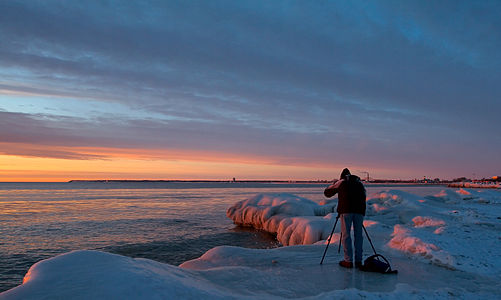 A photographer capturing a sunrise, Milwaukee