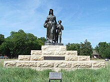 The Pioneer Woman statue and base. Pioneer Woman Historical Statue Ponca City, Oklahoma.jpg