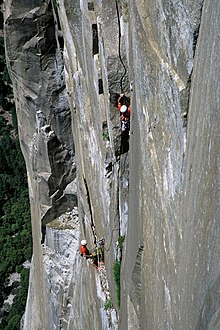 Lead climber and belayer (in a hanging belay position) on the multi-pitch El Nino 8b (5.13d), El Capitan Pou Anaiak el nino 8b - panoramio.jpg