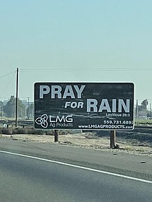 A billboard in Tipton in 2022. Pray for Rain - March 2022 - Sarah Stierch.jpg