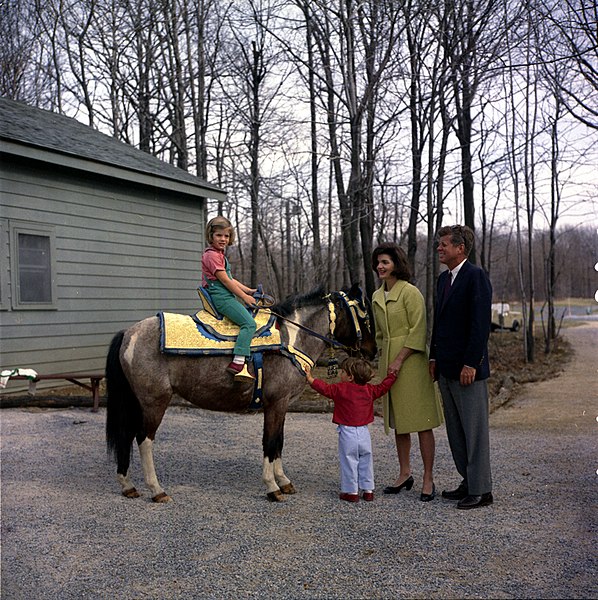 File:President John F. Kennedy and Family Watch Caroline Kennedy Riding a Horse Named Tex at Camp David.jpg