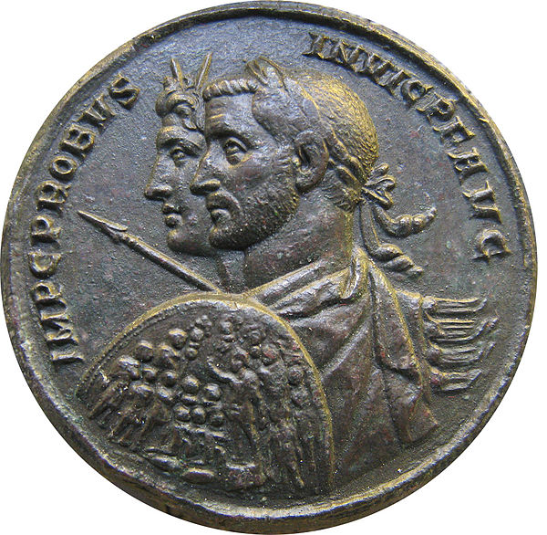 A coin of the late 3rd century emperor Probus, marked with abbreviated titles and honorifics:  imp·c·probus·invic·p·f· aug