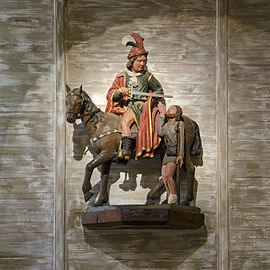 La Charité de saint Martin bois polychrome, XVIIe siècle, église Saint-Pierre de Saulges.