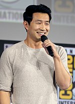 Director Destin Daniel Cretton and lead actor Simu Liu at San Diego Comic-Con in July 2019