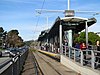 Stonestown station from track crossing, December 2017.JPG