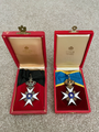 Pre and Post-1975 sets of the Commander grade of the Order.