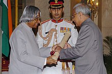 The President, Dr. A.P.J. Abdul Kalam presenting Padma Vibhushan to Justice Visheshwar Nath Khare at investiture ceremony, in New Delhi on March 29, 2006 The President, Dr. A.P.J. Abdul Kalam presenting Padma Vibhushan to Justice Visheshwar Nath Khare at investiture ceremony, in New Delhi on March 29, 2006.jpg