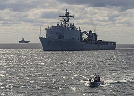 USS Whidbey Island conduct small boat operations with the amphibious assault ship USS Wasp. (26340416211).jpg