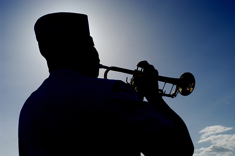 File:US Navy 030521-N-8157C-025 A Sailor plays Taps to honor those killed 59 years ago in Hawaii's West Loch tragedy when explosions of unknown origin killed 163, injured 396, and sunk eight ships.jpg