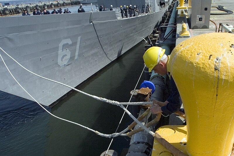 File:US Navy 070518-N-3390M-005 Boatswain's Mate 2nd Class Randal Walters, assigned to guided-missile destroyer USS Shoup (DDG 86), dips the eye while securing forward mooring lines to a bollard as guided-missile frigate USS I.jpg