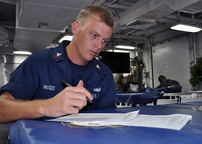 File:US Navy 101109-N-3620B-022 Boatswain's Mate 2nd Class Kerry McGee takes a medical level-of-knowledge examination aboard the amphibious transport do.jpg