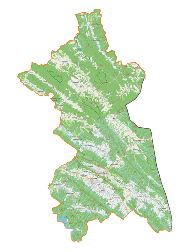 Mapa konturowa gminy Ustrzyki Dolne, blisko centrum na dole znajduje się punkt z opisem „Ustrzyki Dolne”