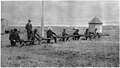 English: HAND-GRENADES SHOT FROM A GUN!—THE AARSEN GRENADE-GUN BEING LOADED.