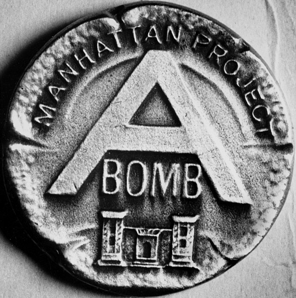 File:"MANHATTAN PROJECT" "A BOMB" 1945 pin detail, from- A Award Pin 1945 Oak Ridge (15605091331) (cropped).jpg