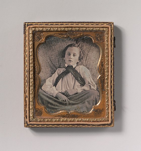 File:-Boy Seated Cross-legged, Partially Covered by Blanket, Leaning Against Cushion- MET DP700070.jpg
