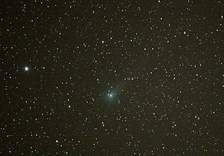 Sporting a vague tail to the 2 o'clock on 9 May 2007 from Mount Laguna. The star is Mu Draconis (mag 4.90)