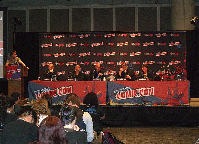 Morrison (fourth from left) at the Legendary Comics panel at the 2012 New York Comic Con. Also on stage, from left to right: Bob Schreck, Matt Wagner,