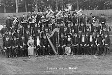 The early instrumentation of a large concert band (including violin soloist Nicoline Zedeler) is shown by the John Philip Sousa Band during their 1911 world tour. 1911 Sousa Band.jpg