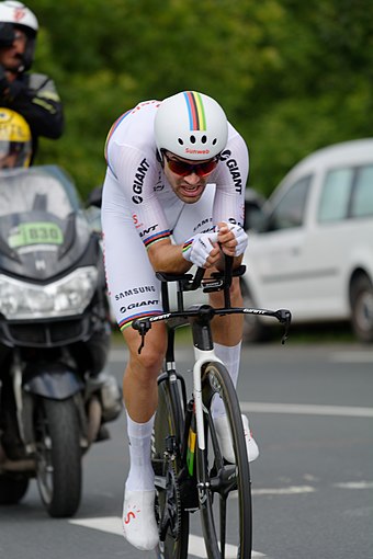 Dumoulin wearing the rainbow jersey, as the incumbent world time trial champion, during Stage 20 of the 2018 Tour de France