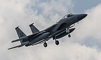 A US Air Force F-15C Eagle, tail number 80-0012, on final approach at Kadena Air Base in Okinawa, Japan