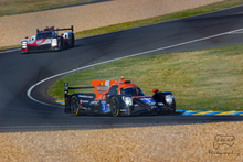 The Oreca 07 of DKR Engineering at the 2022 24 Hours of Le Mans. 2022 24 Hours of Le Mans (52174504182).png