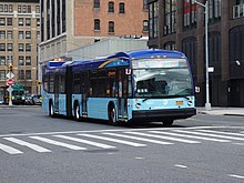 A bus on the M23 SBS route 23rd St 11th Av td (2018-11-27) X07.jpg