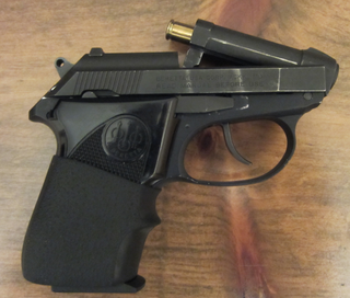 <span class="mw-page-title-main">Tip-up barrel</span> Type of semi-automatic pistol design that facilitates loading